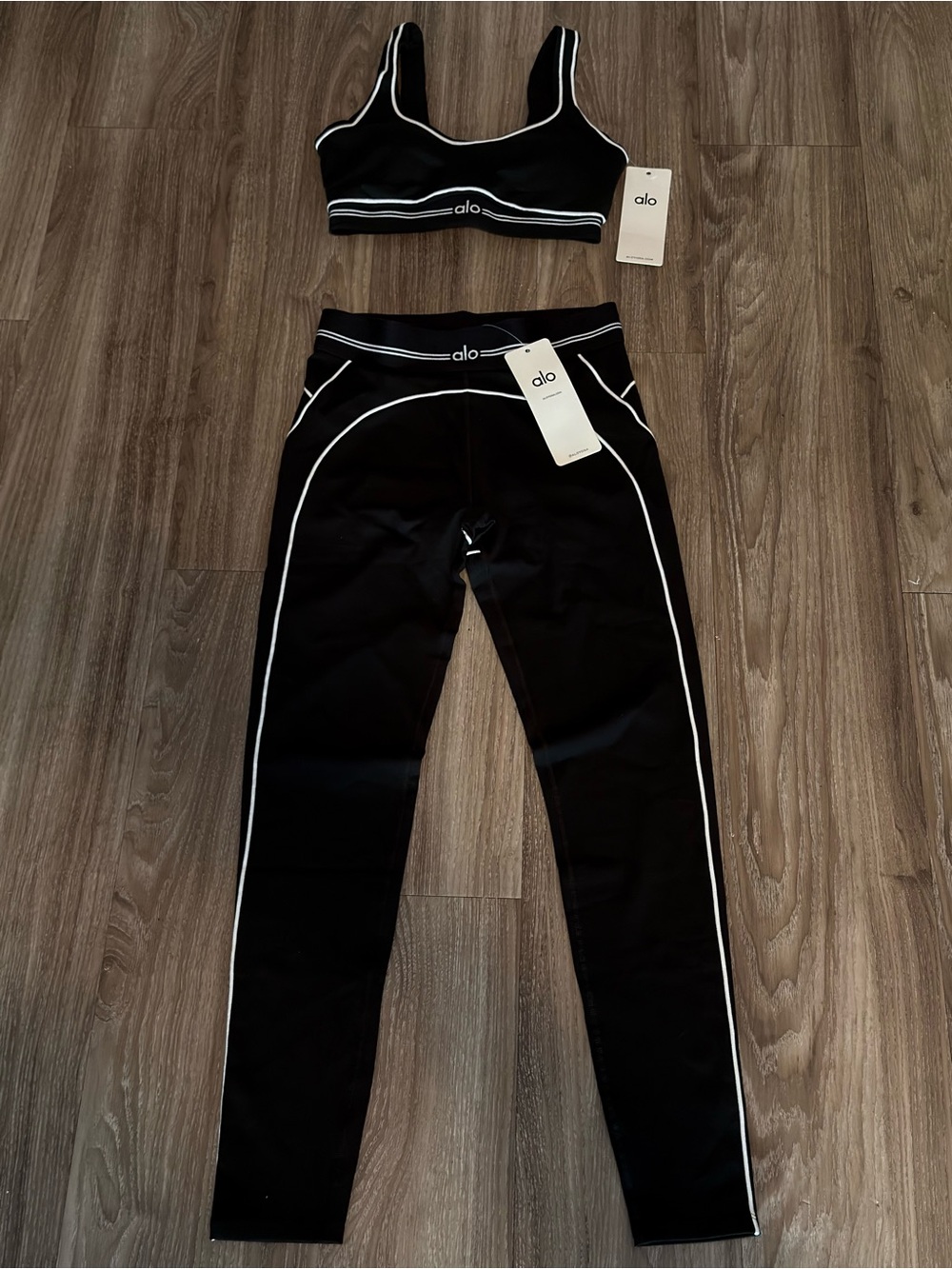 ALO Yoga Black Sports Bra and legging with White Contrast Stitching
